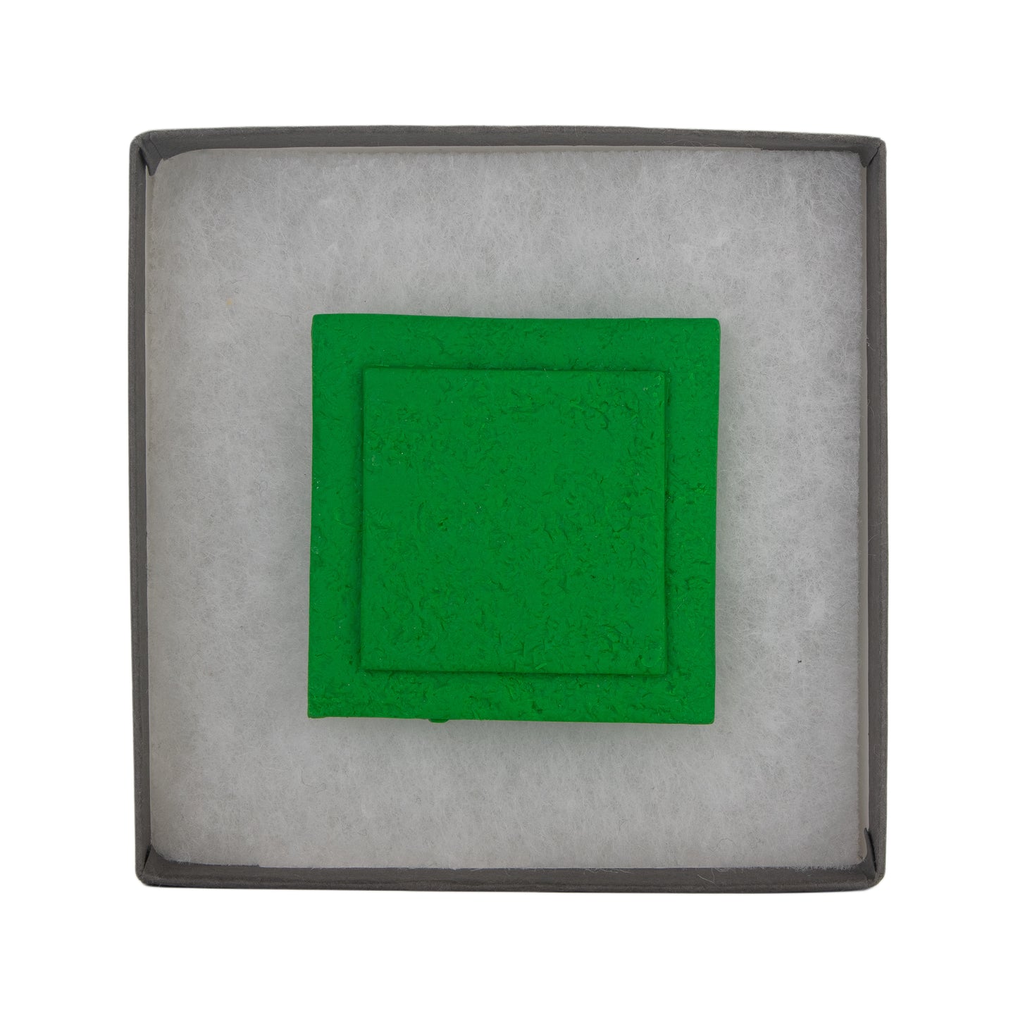 Layered green square polymer clay brooch in textured finish.