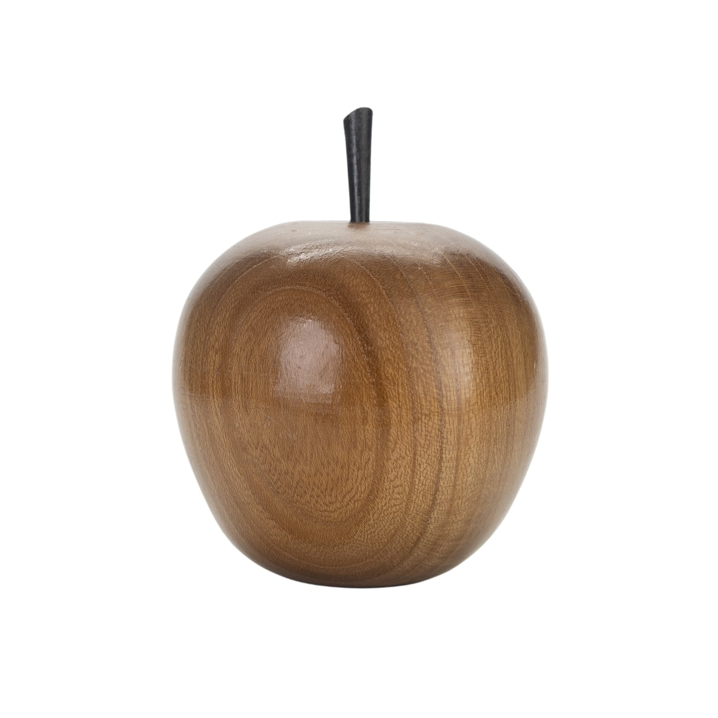 Wooden apple with a black stem on a white background