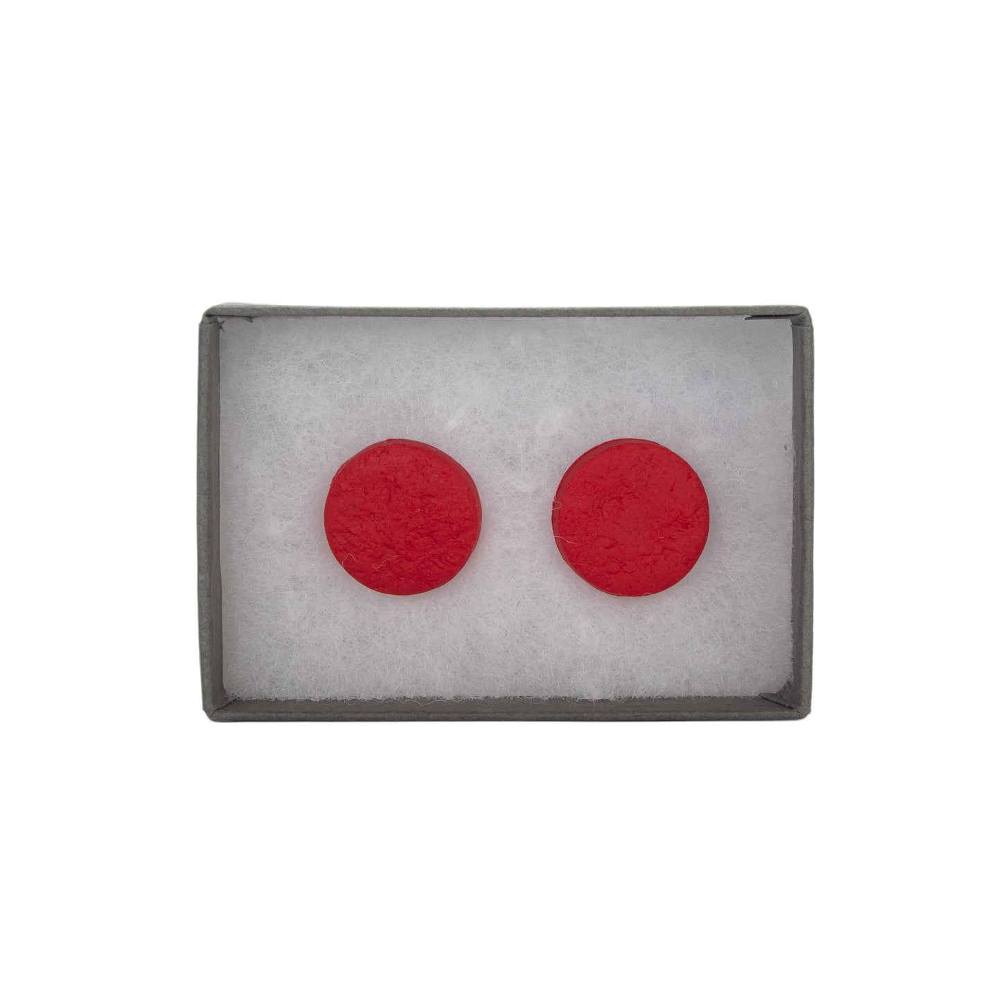 Red circular earrings in a gray box on a white background