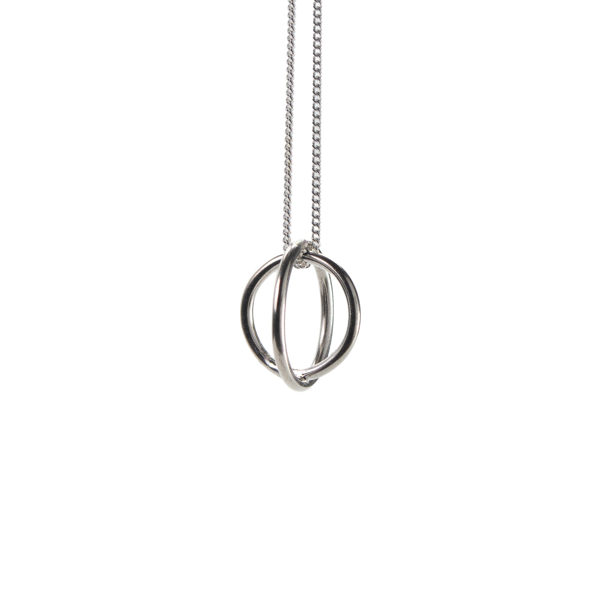 Silver necklace with a unique pendant on a white background