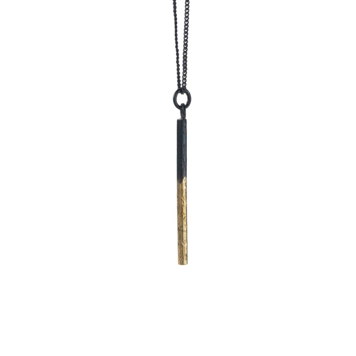 Oxidised silver pillar pendant with gold detail on an 18-inch chain by Bianca O’Neill Jewellery.