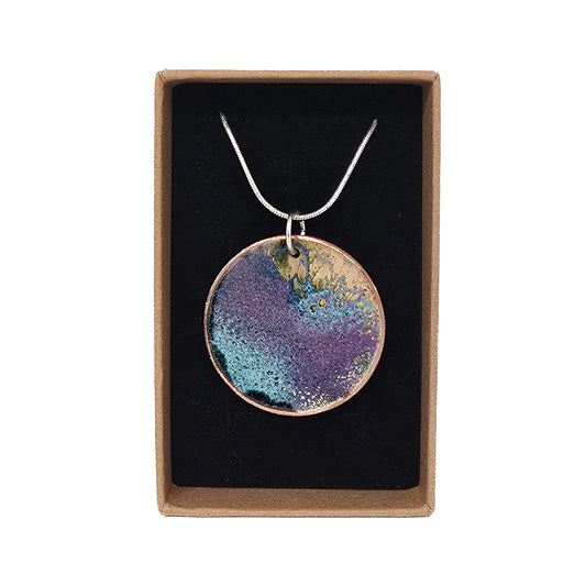 Copper disk pendant necklace with teal and purple enamel on 18-inch silver-plated snake chain