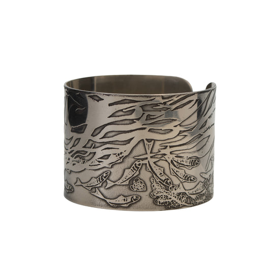 Wide handmade pewter cuff bracelet with “Silver Darlings” fish and kelp etching by JLG Pewter Craft.