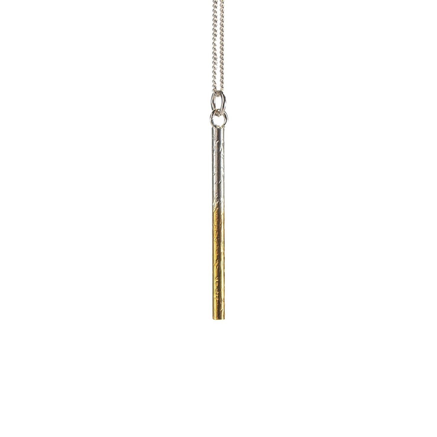 Handmade sterling silver pillar pendant with selective gold plating by Bianca O’Neill Jewellery.