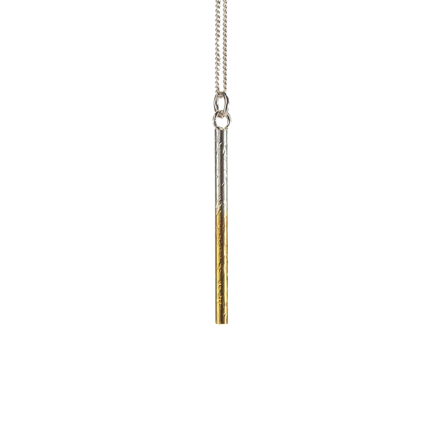 Handmade sterling silver pillar pendant with selective gold plating by Bianca O’Neill Jewellery.