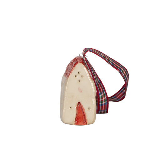 Handmade ceramic house hanging ornament with red roof and tartan ribbon by Little Bird Ceramics.