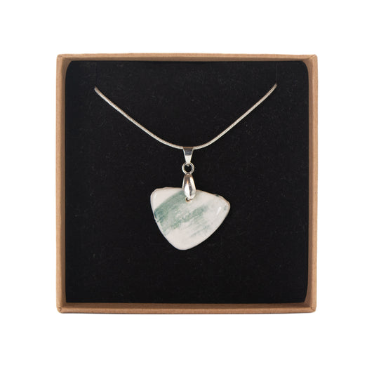 Brushed green and white ceramic pendant necklace on 18-inch snake chain.